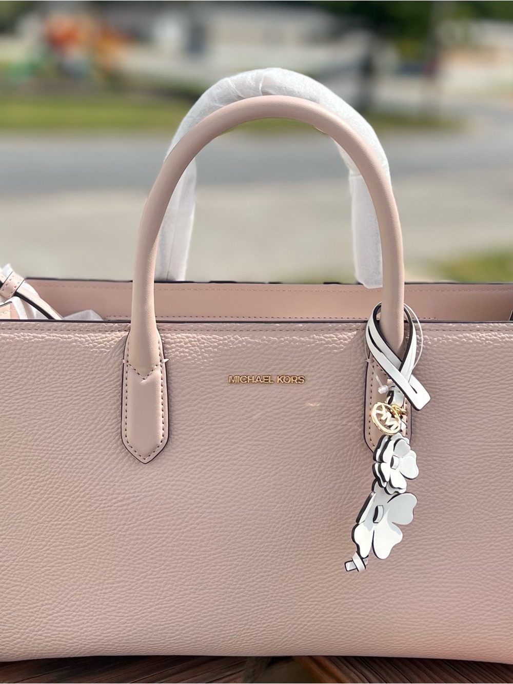 Michael Kors Blush Pink Pebbled Leather Satchel with Floral Charm